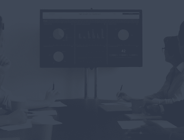 Collaborate around your HR metrics - team in conference room analyzing HR dashboard - featured image